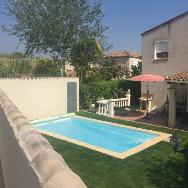 Lfa-construction-renovation-exterieure-tour-de-piscine-gazon